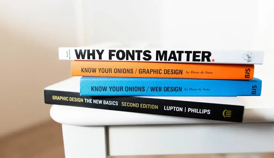 Stack of books relating to graphic design