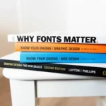 Stack of books relating to graphic design