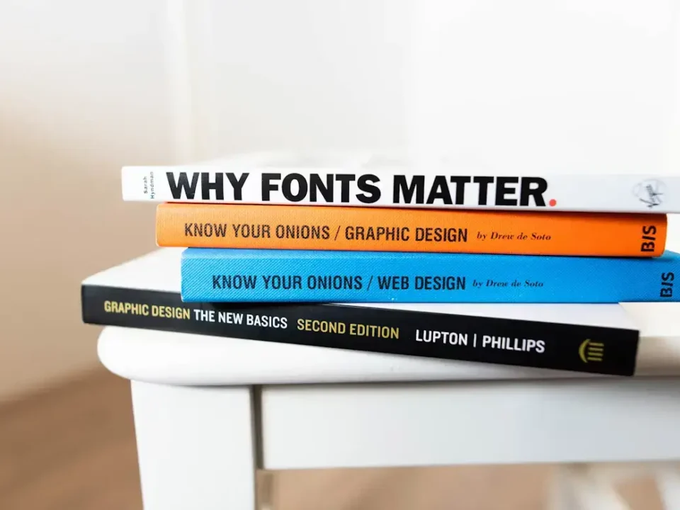 Stack of books relating to graphic design